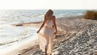 pic for Girl In White Dress On Beach 